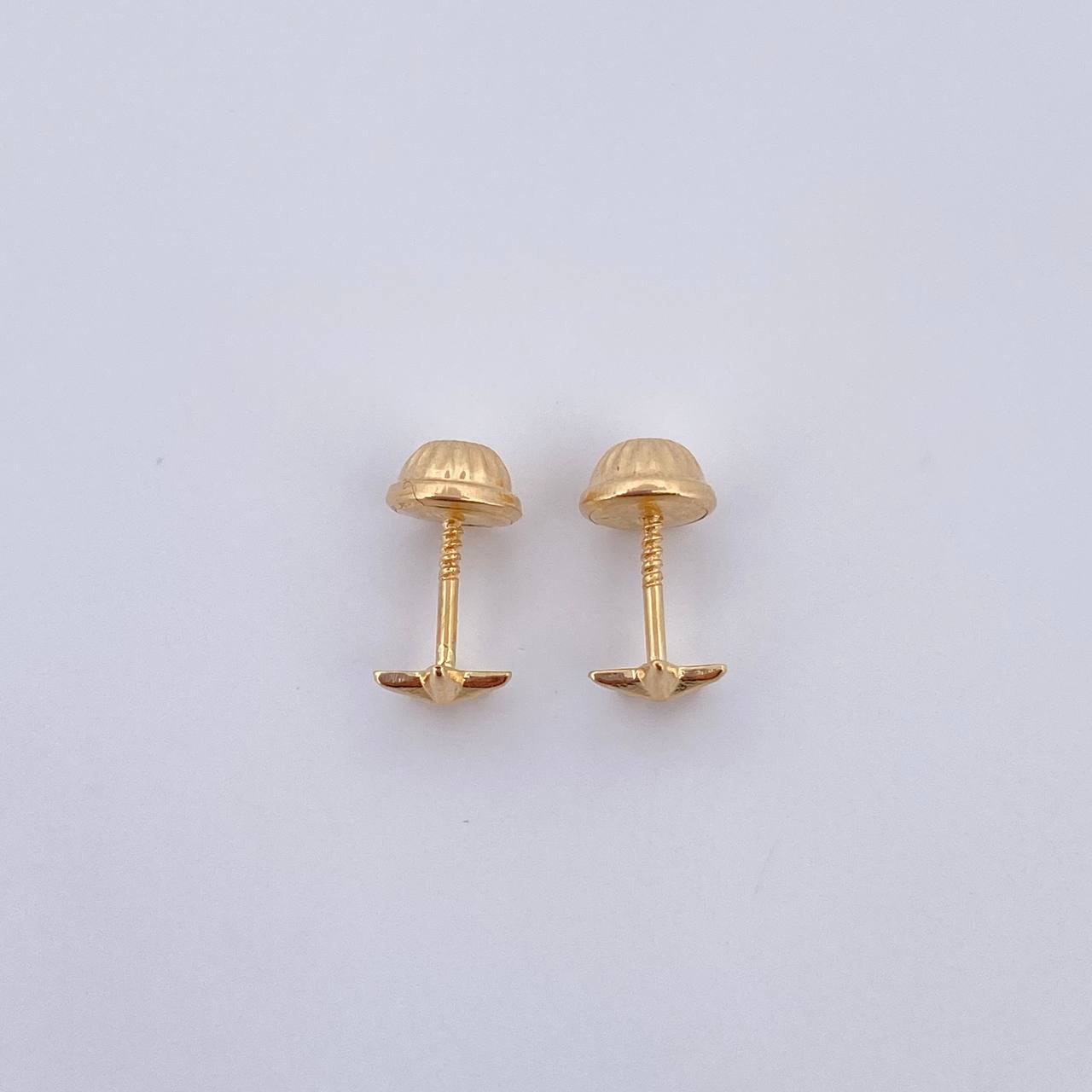 Topos Estrella 0.45gr / Troquelado Oro Amarillo 18K $