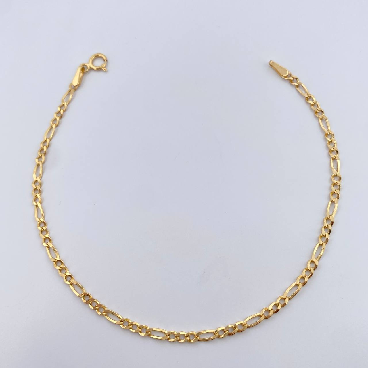 Pulso Figaro 1.1gr / 18.6cm / 2.1mm Oro Amarillo +1 18K &