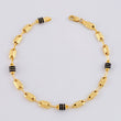 Pulso Rustico Cauchos Negros 3.3g / 7 1/2 in / 4.2mm Oro Amarillo 18K
