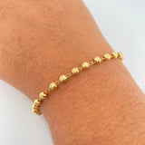 Pulso Tipo Militar 3.15gr / 19cm / 4mm Bolas Diamantadas Oro Amarillo 18K $