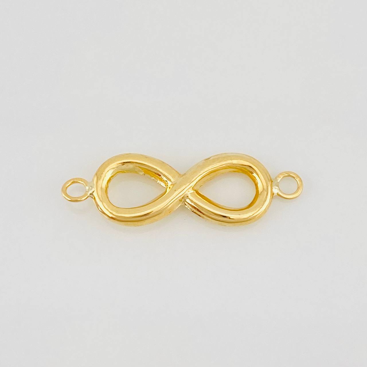 Herraje Infinito 0.6g / 1 in Oro Amarillo 18K