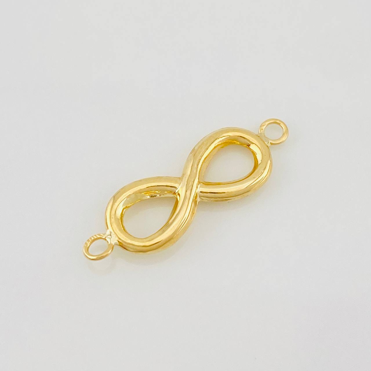 Herraje Infinito 0.6g / 1 in Oro Amarillo 18K