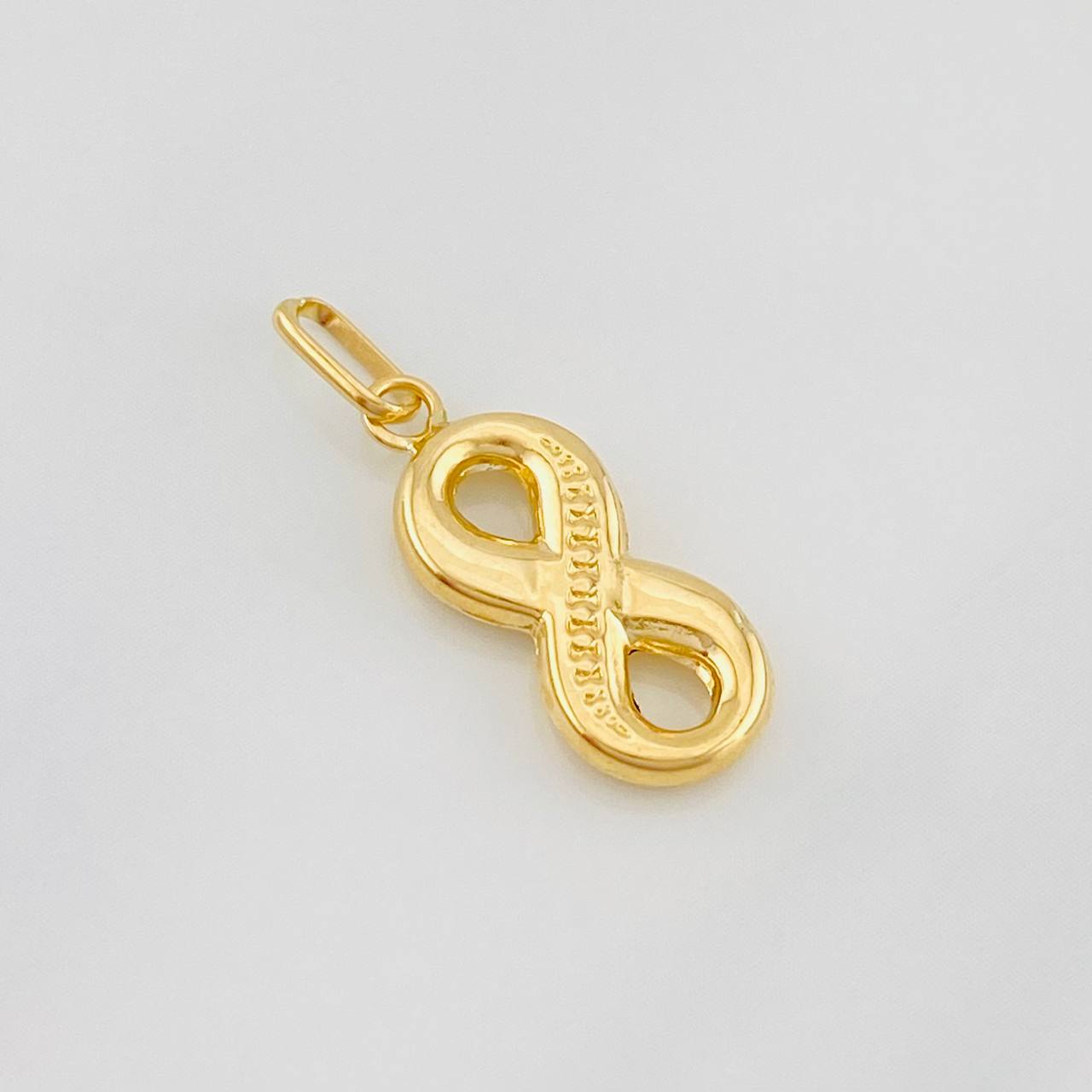 Dije Infinito 0.6g / 3/4 in Oro Amarillo 18K