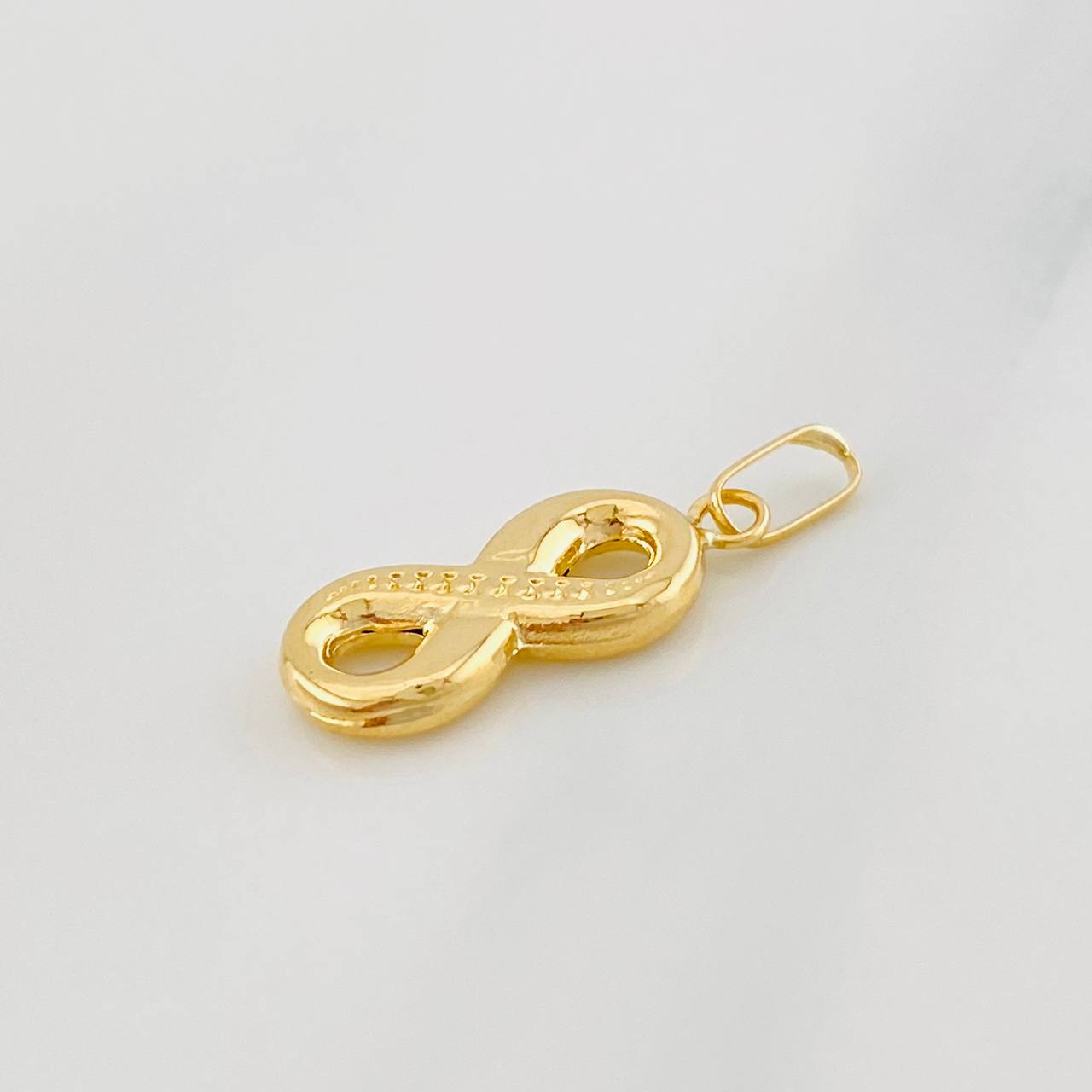 Dije Infinito 0.6g / 3/4 in Oro Amarillo 18K