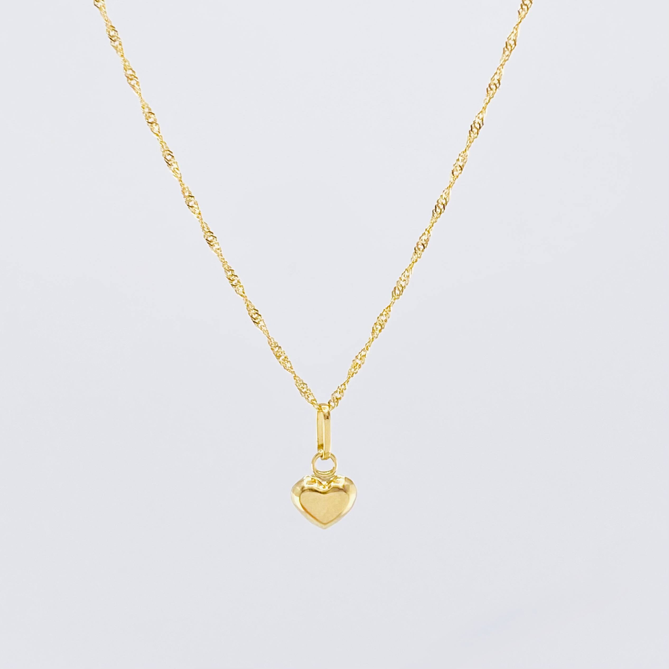 Set Cadena y Dije Singapur + Corazón 1.3gr / 19 3/4 in / Oro Amarillo 18K ©