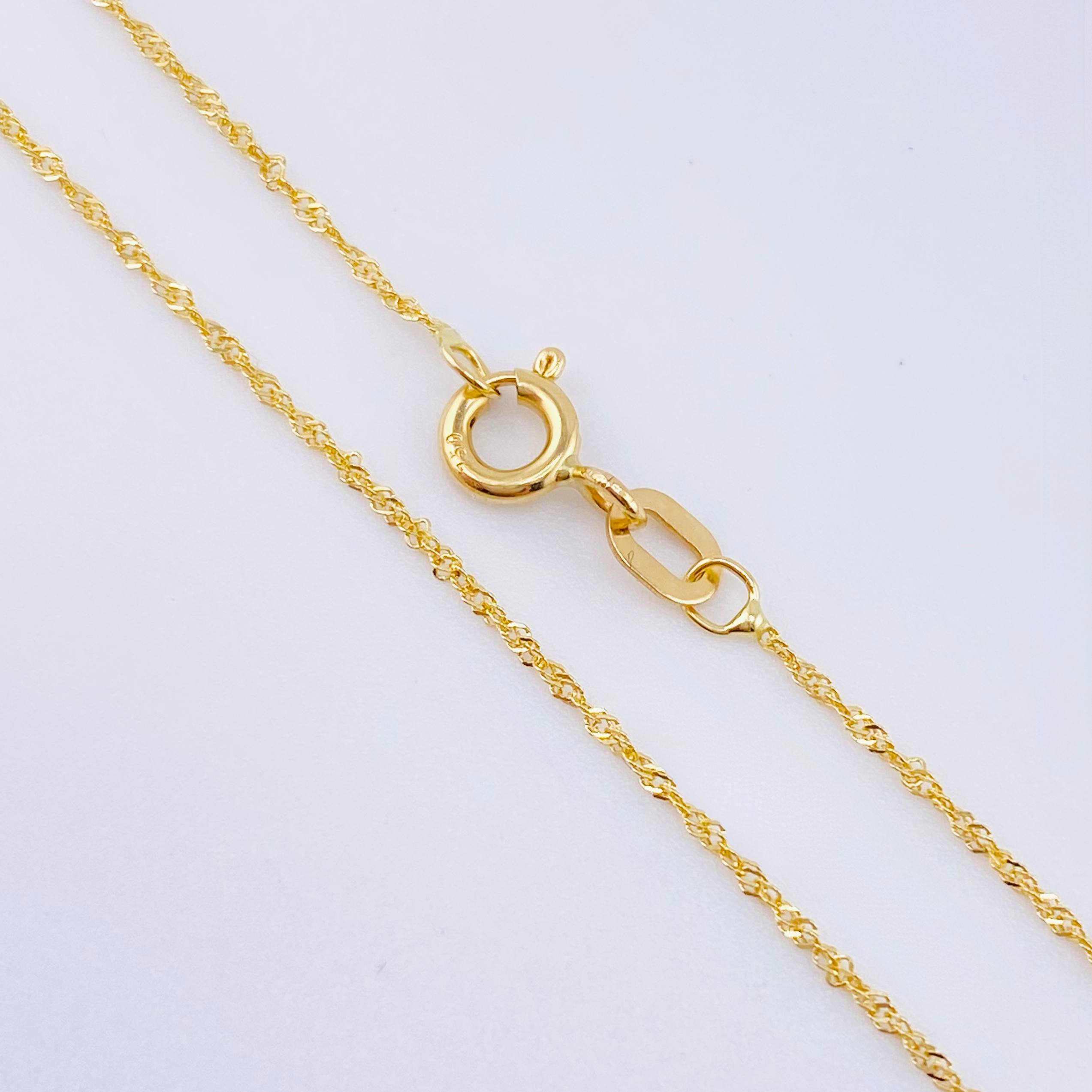 Set Cadena y Dije Singapur + Cruz 1.3gr / 19 3/4 in / Oro Amarillo 18K ©