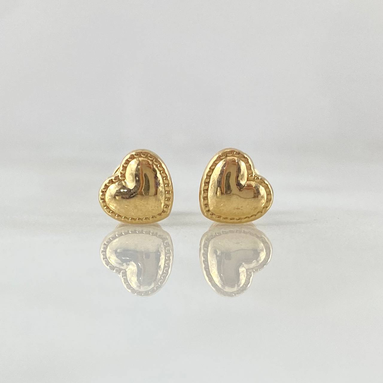 Topos Corazon Bordeado 0.65gr / 6.8mm Oro Amarillo 18K *
