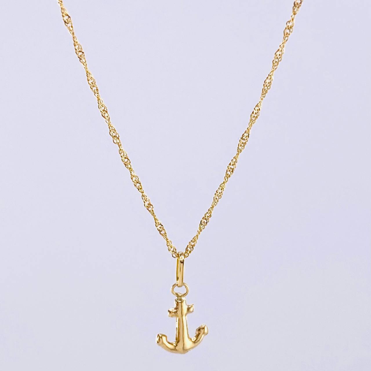 Set Cadena y Dije Singapur + Ancla 1.25gr / 17 3/4 in / Oro Amarillo 18K
