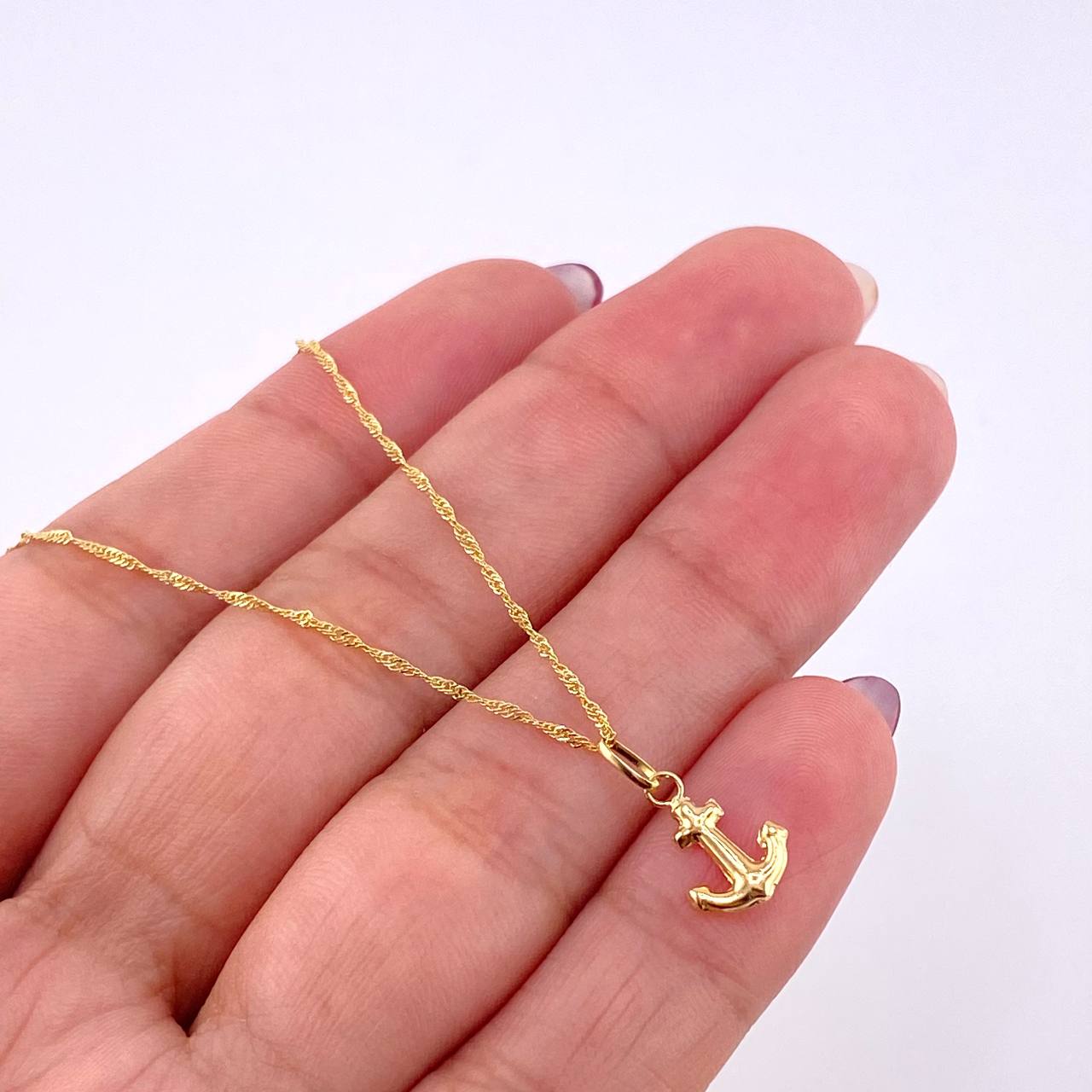 Set Cadena y Dije Singapur + Ancla 1.25gr / 17 3/4 in / Oro Amarillo 18K