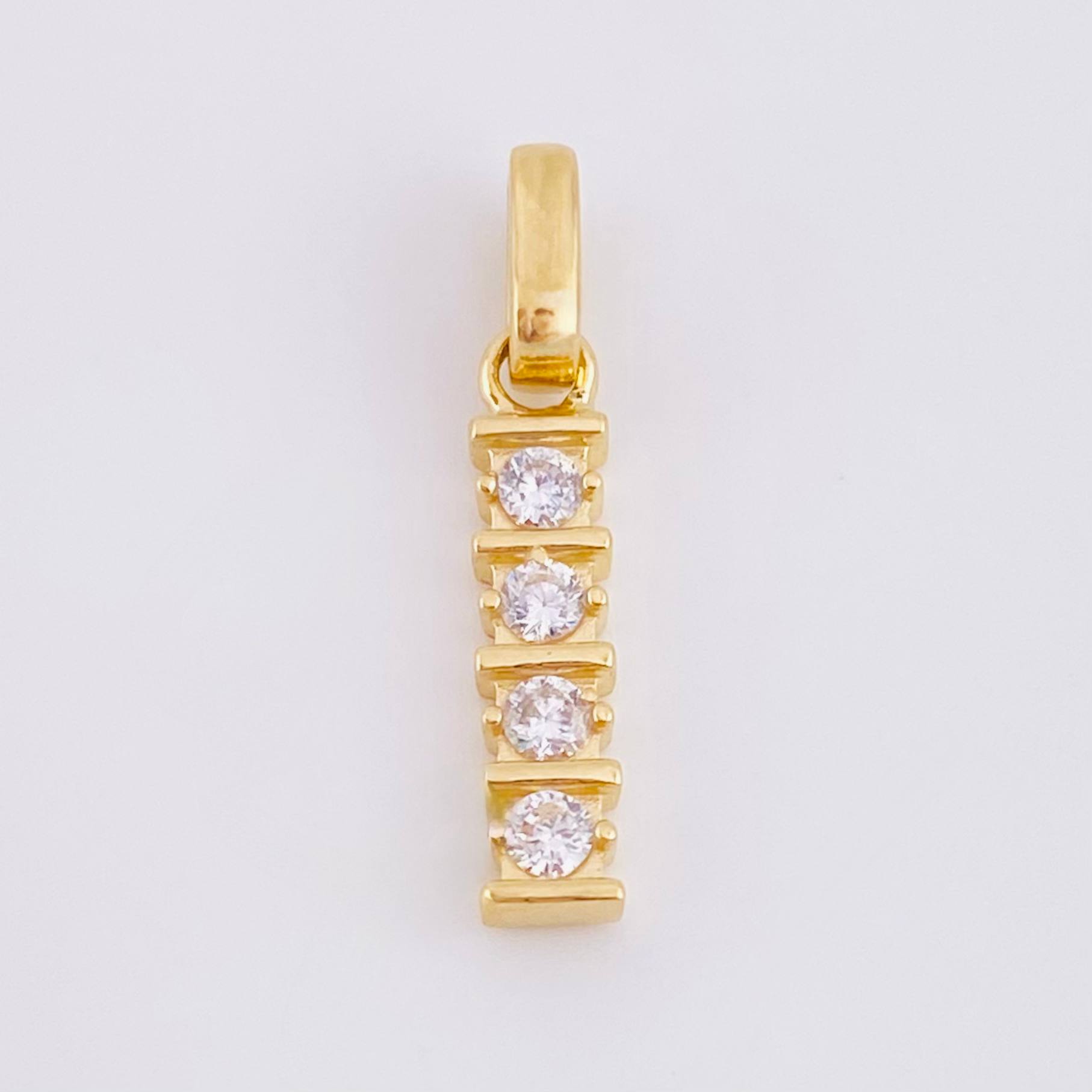 Dije Fila Intersecta 1.2gr / 1 in / Oro Amarillo 18K *
