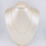 Flat Mariner Chain 1.75 g / 17 3/4 in / 1.4 mm 18K Yellow Gold