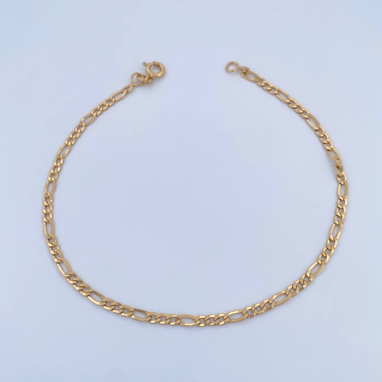 Tobillera Figaro 2.1gr / 23.3cm / 2.9mm Oro Amarillo +1 18K $