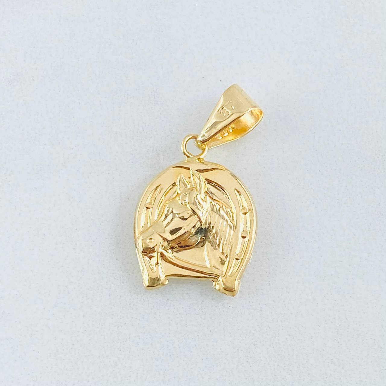 Dije Herradura Caballo 1.15gr / 3/4 in / Oro Amarillo 18K ©