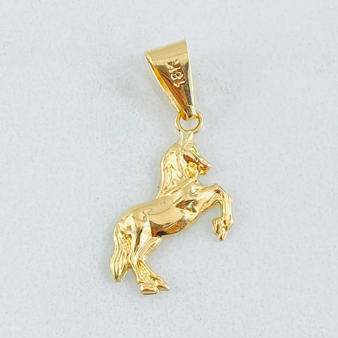 Dije Caballo 0.65gr / 1 in / Oro Amarillo 18K