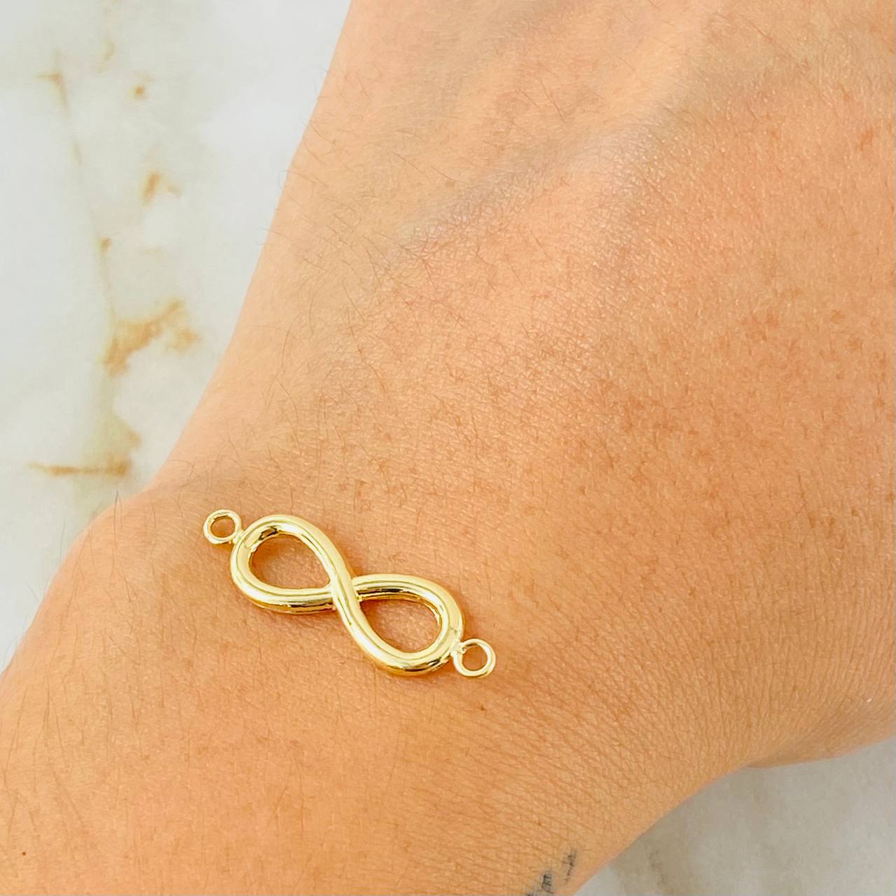 Herraje Infinito 0.9gr / 1 in / Oro Amarillo 18K