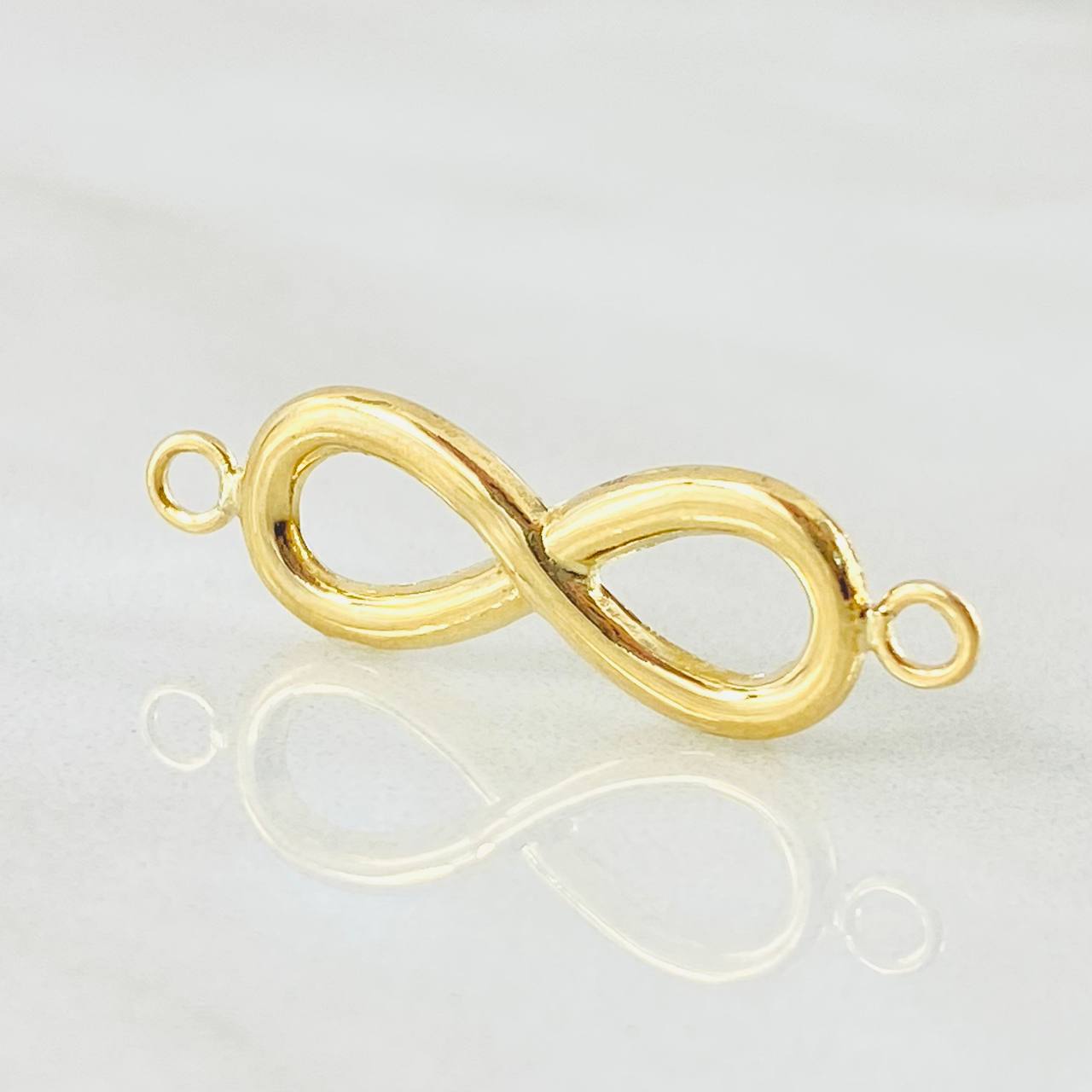 Herraje Infinito 0.9gr / 1 in / Oro Amarillo 18K