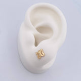 Topos Mariposa 0.9gr / Circones Blancos Oro Amarillo 18K $