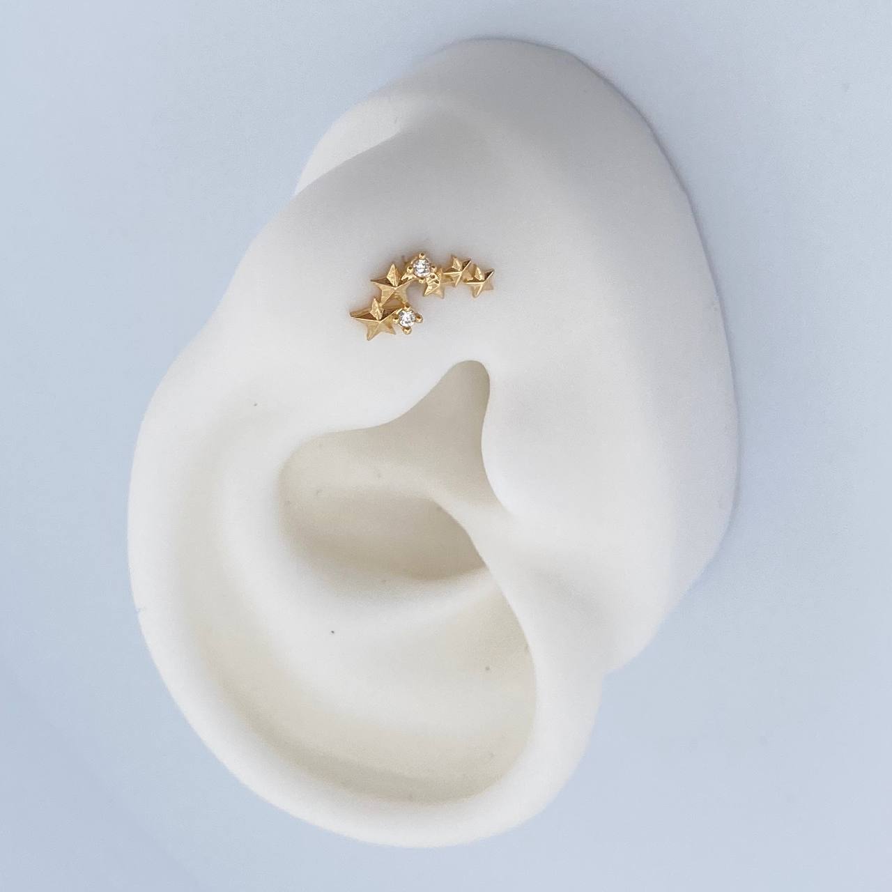 Topos Estrellas 0.85gr / Circones Blancos Oro Amarillo 18K $