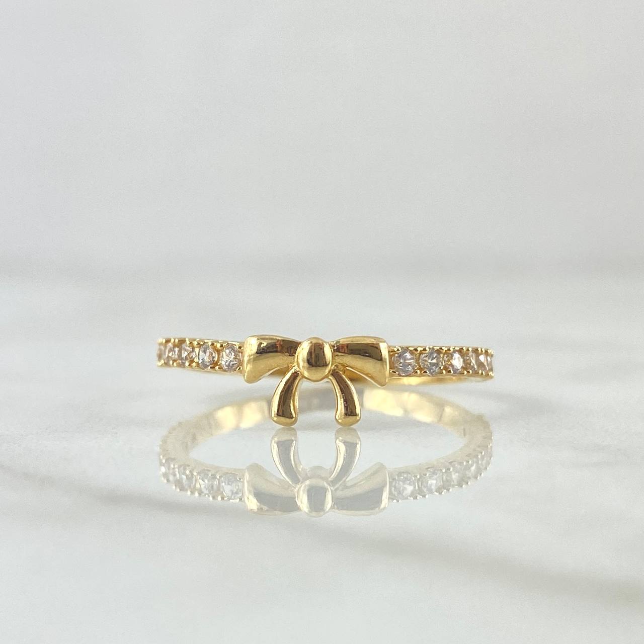 Bow Ring In Half Churumbela 1.7gr / Size 5 1/2 / White Zircons 18K Yellow Gold