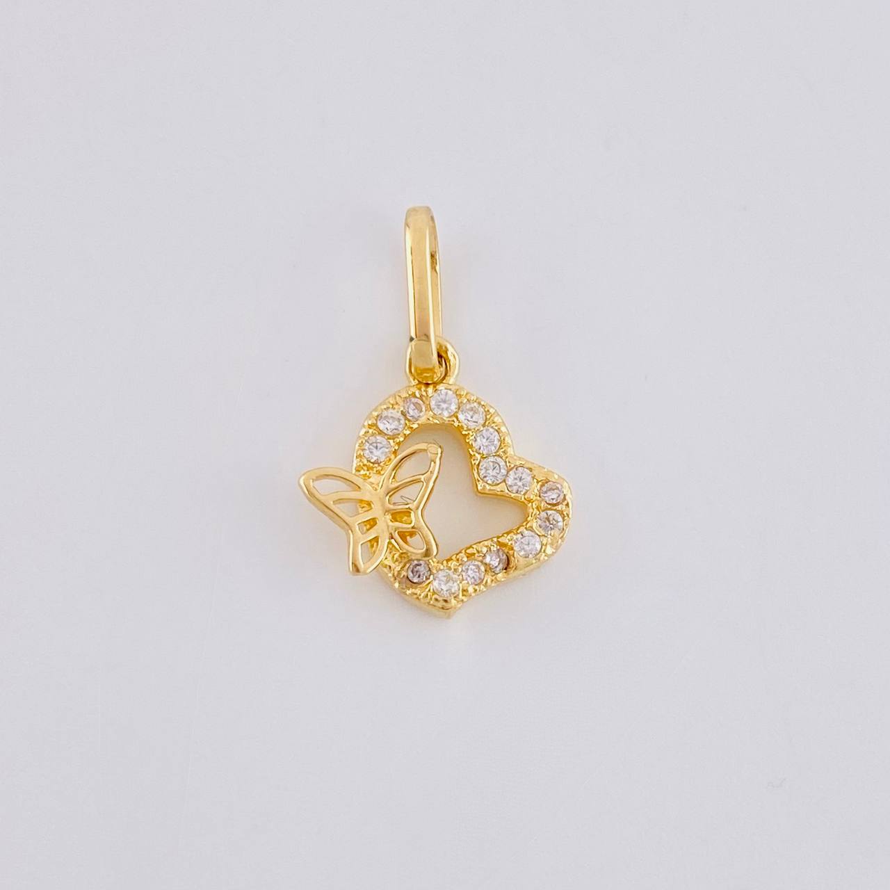 Dije Silueta Corazon Tupida Mariposa 1g / 1/2 in Oro Amarillo 18K