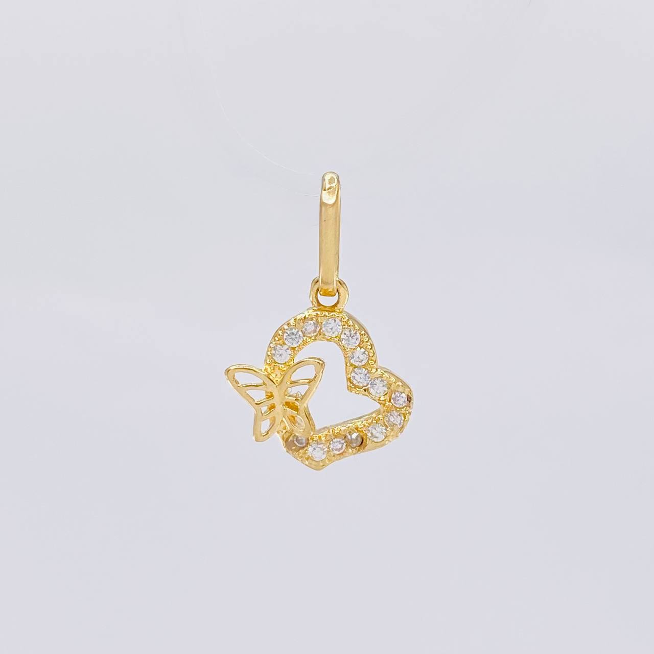 Dije Silueta Corazon Tupida Mariposa 1g / 1/2 in Oro Amarillo 18K