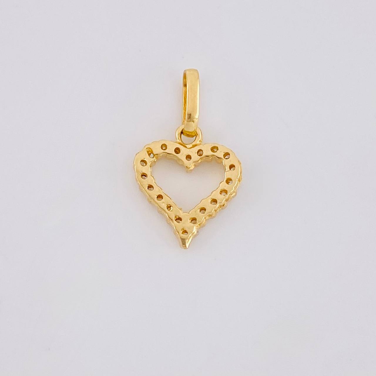 Dije Silueta Corazon Tupida 0.8g / 3/4 in Oro Amarillo 18K