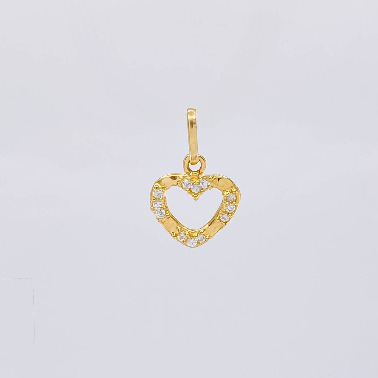 Dije Silueta Corazon Tupido 0.7g / 1/2 in Oro Amarillo 18K