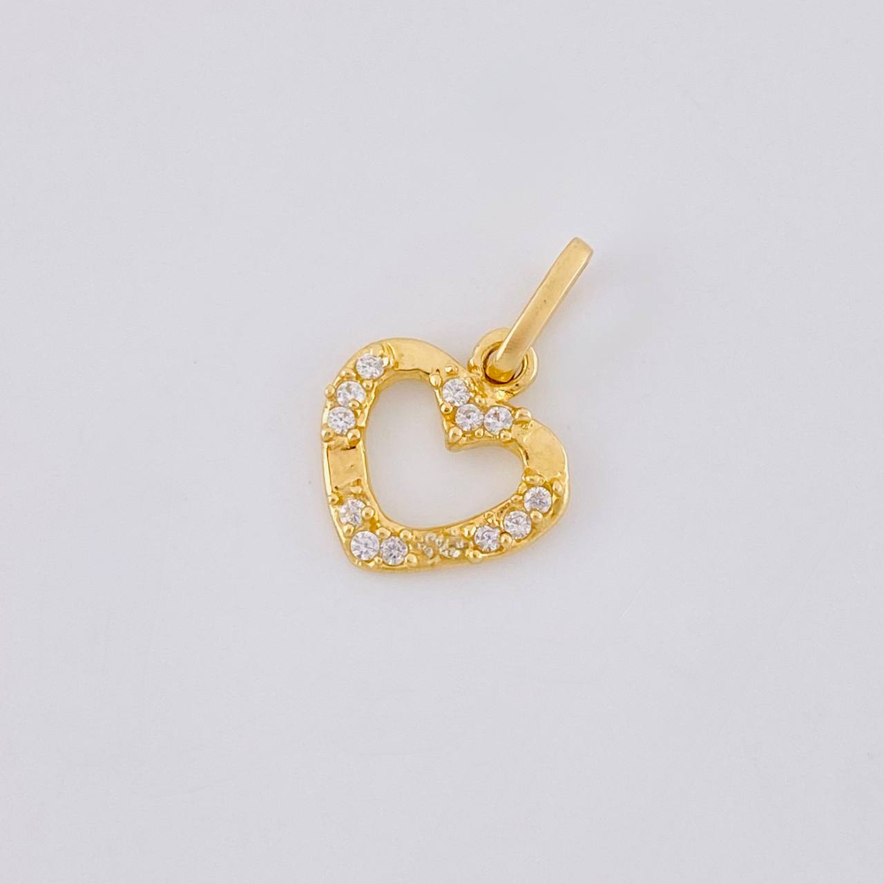 Dije Silueta Corazon Tupido 0.65g / 1/2 in Oro Amarillo 18K