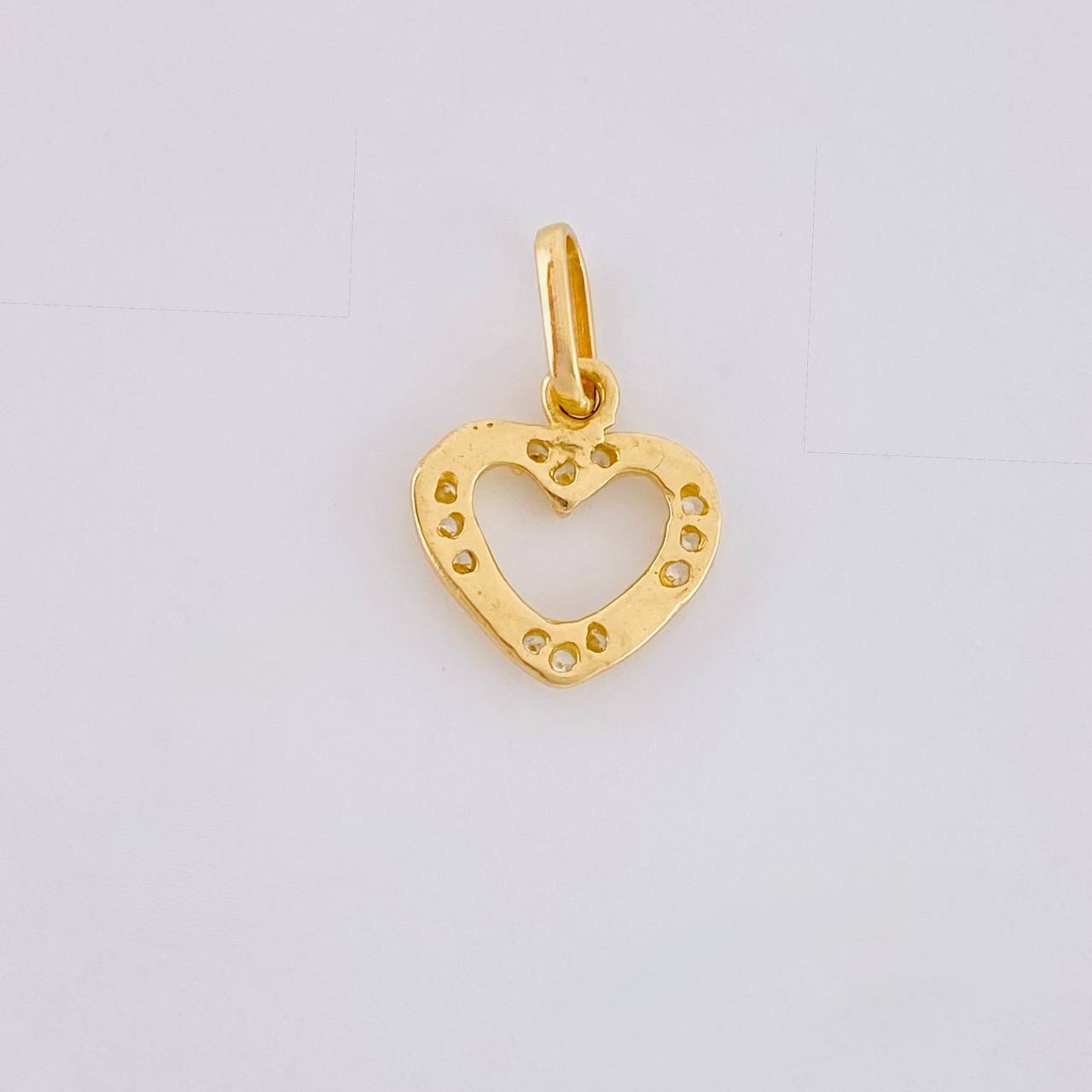 Dije Silueta Corazon Tupido 0.7g / 1/2 in Oro Amarillo 18K