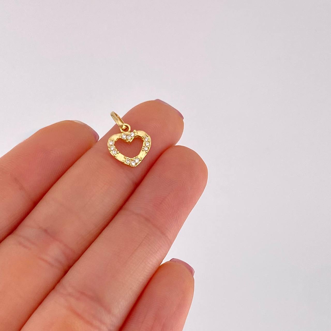 Dije Silueta Corazon Tupido 0.7g / 1/2 in Oro Amarillo 18K