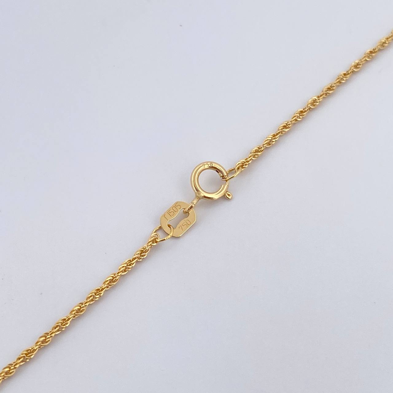 Set Cadena Lazo 0.9gr / 45.1cm / 1mm + Dije Infinito 0.65gr / 1cm Circones Verdes Oro Amarillo 18K (Oferta) $