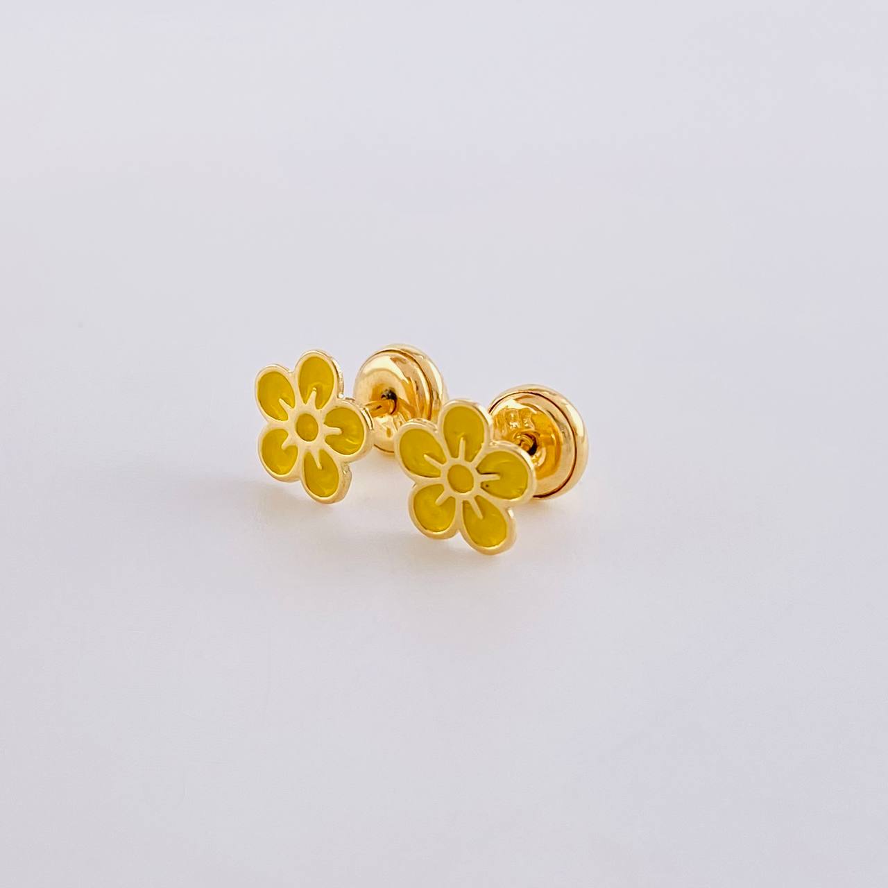 Topos Flor Colombiana 0.65g / in / 7mm Oro Amarillo 18K