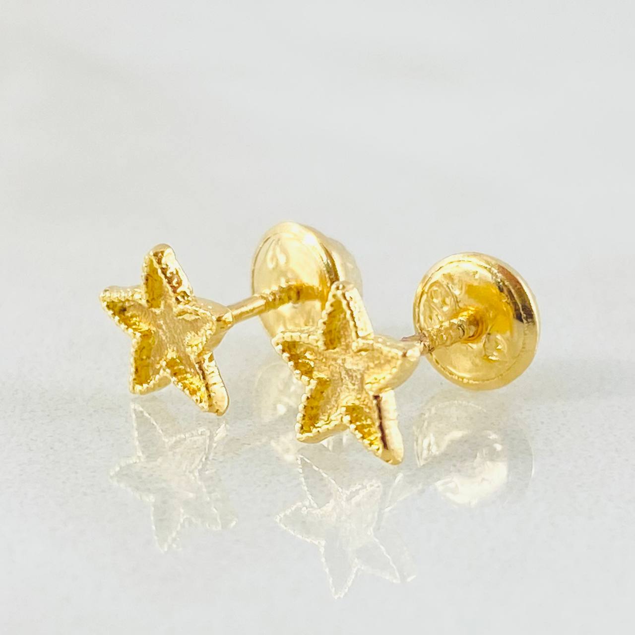 Stud Earrings Star Edged 0.75gr / 18K Gold
