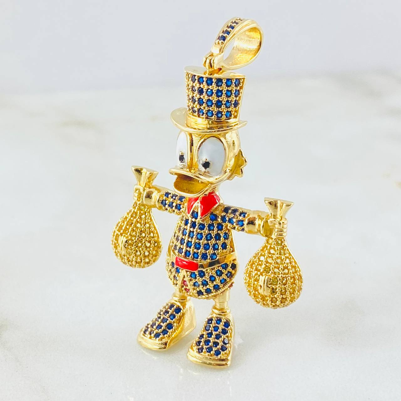 Dije Pato Bolsas Dinero 13.15gr / 2 1/4 in / Oro Amarillo 18K ©