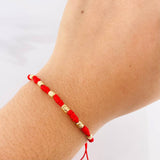 Red Woven Bracelet Seven Knots Yellow Gold 18K