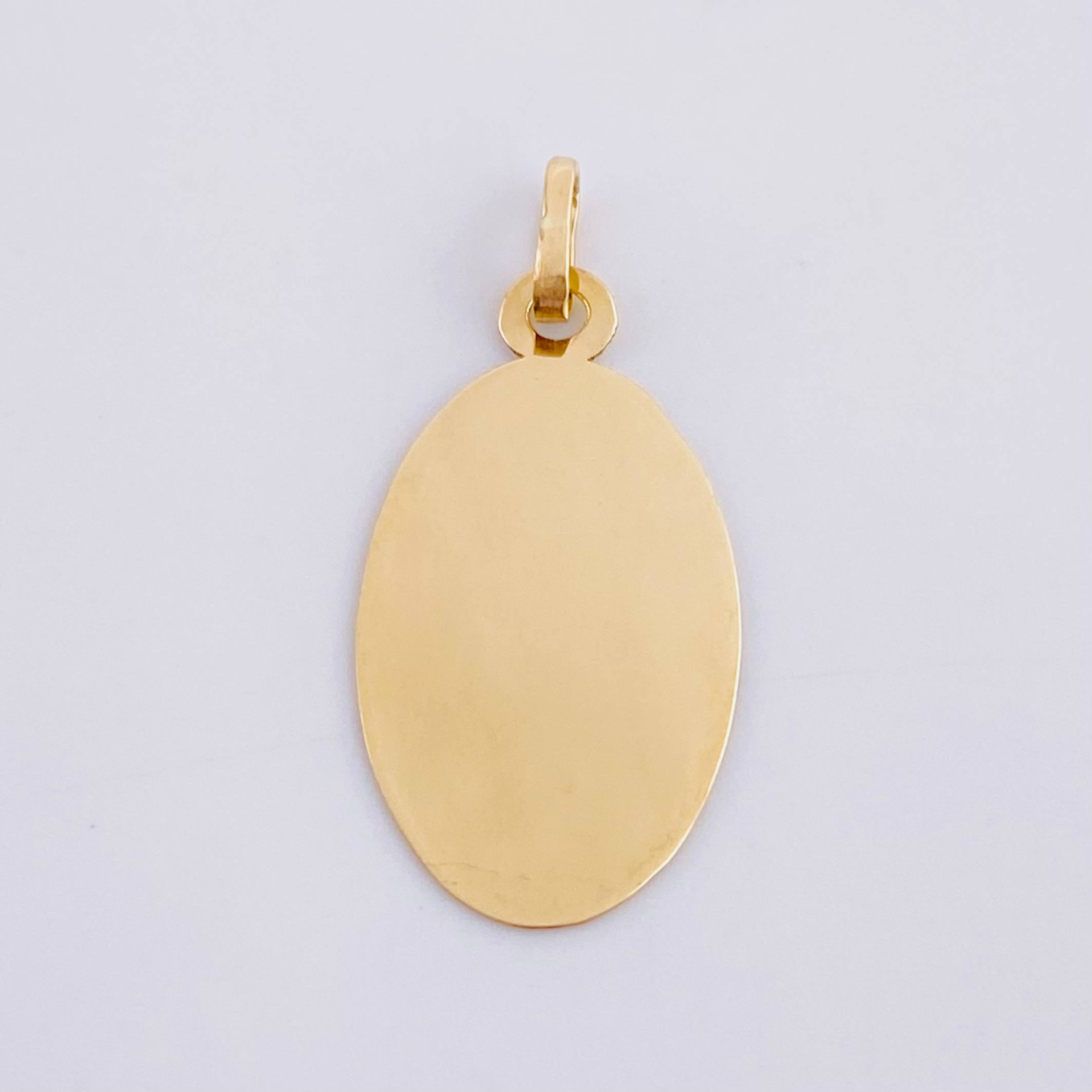 Dije Placa Ovalada 0.85g / 1 in Oro Amarillo 18K