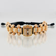 Black Woven Bracelet with Miraculous Christ of Buga Cross in Three 18K Golds