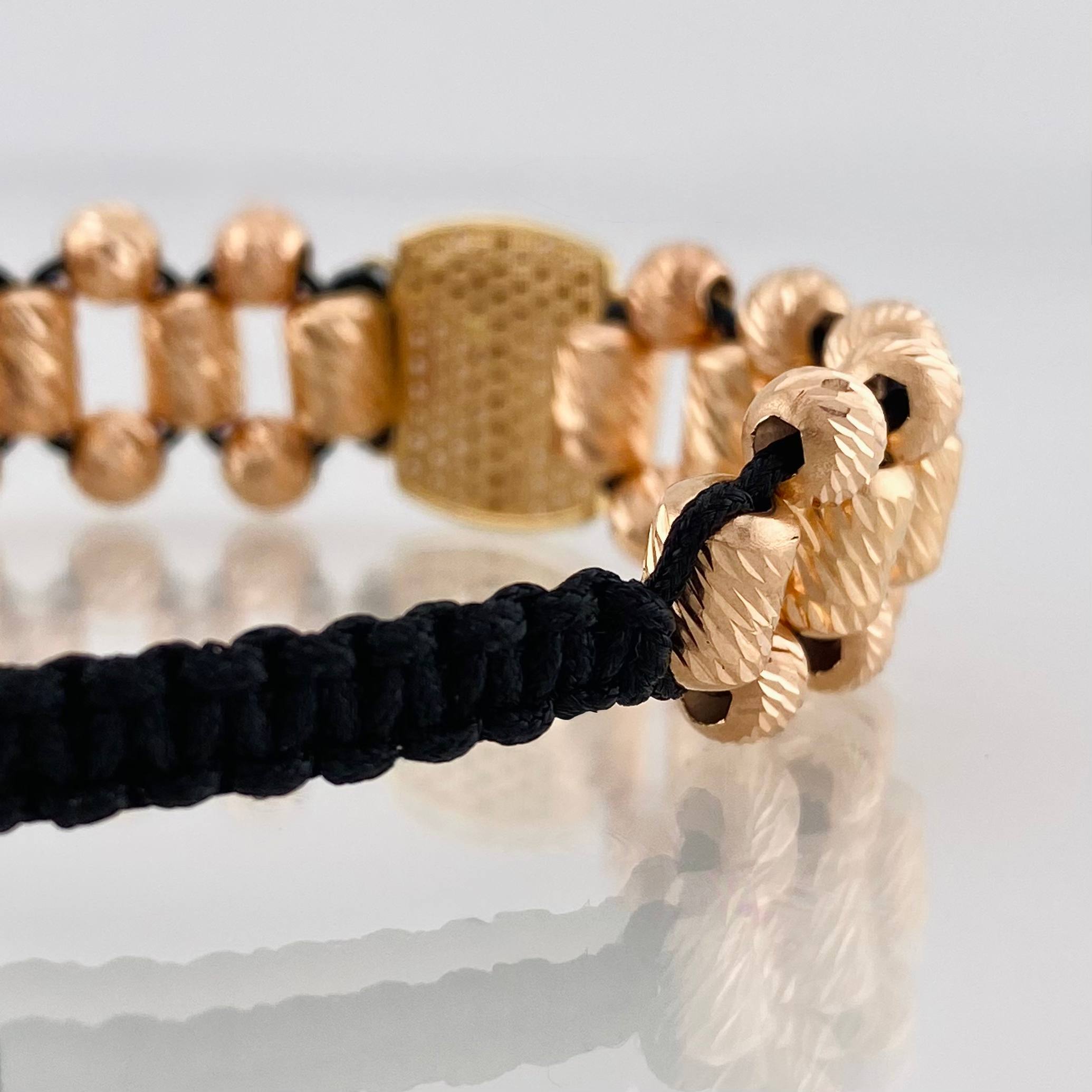 Black Woven Bracelet with Miraculous Christ of Buga Cross in Three 18K Golds