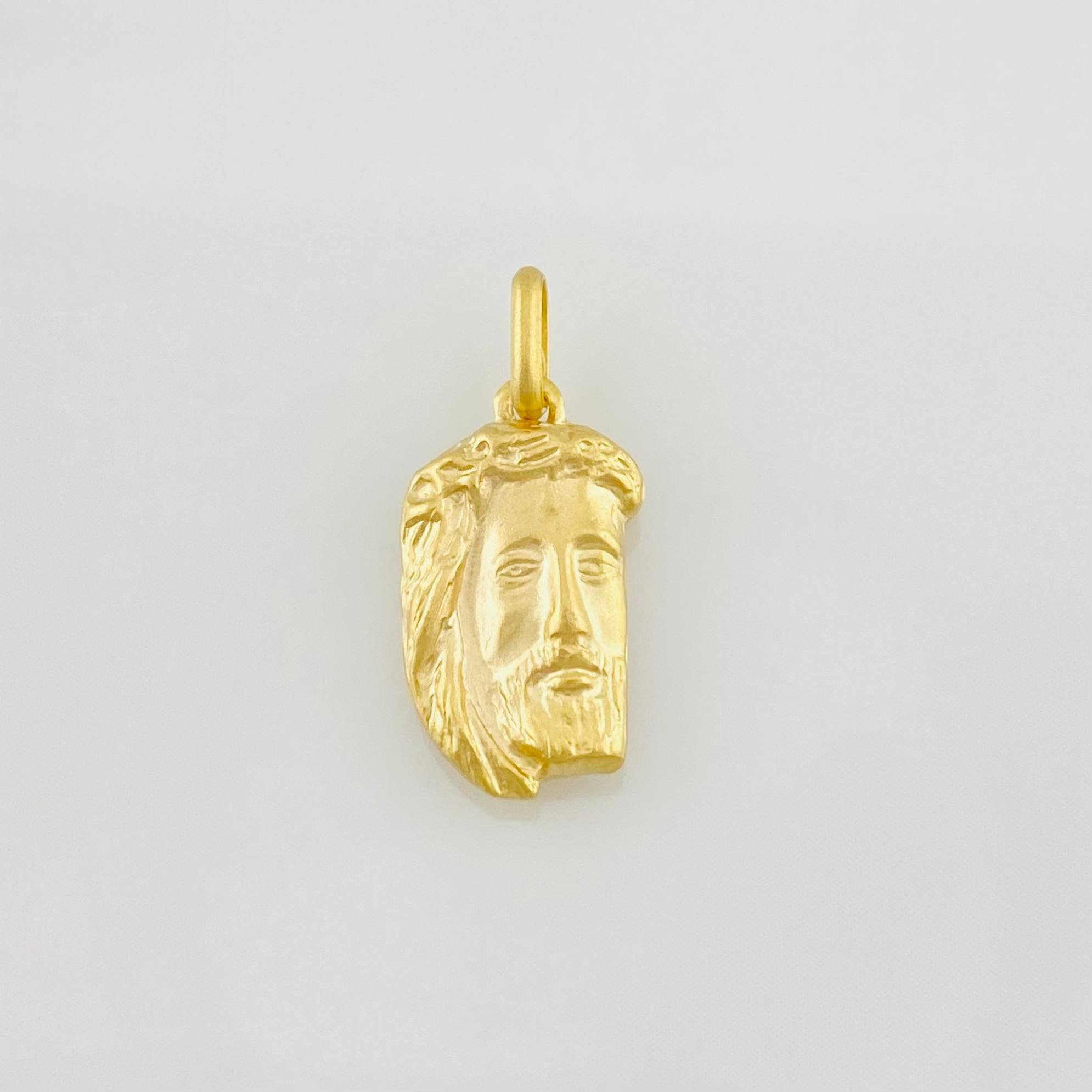 Dije Rostro de Cristo 0.65g / 3/4 in Oro Amarillo 18K