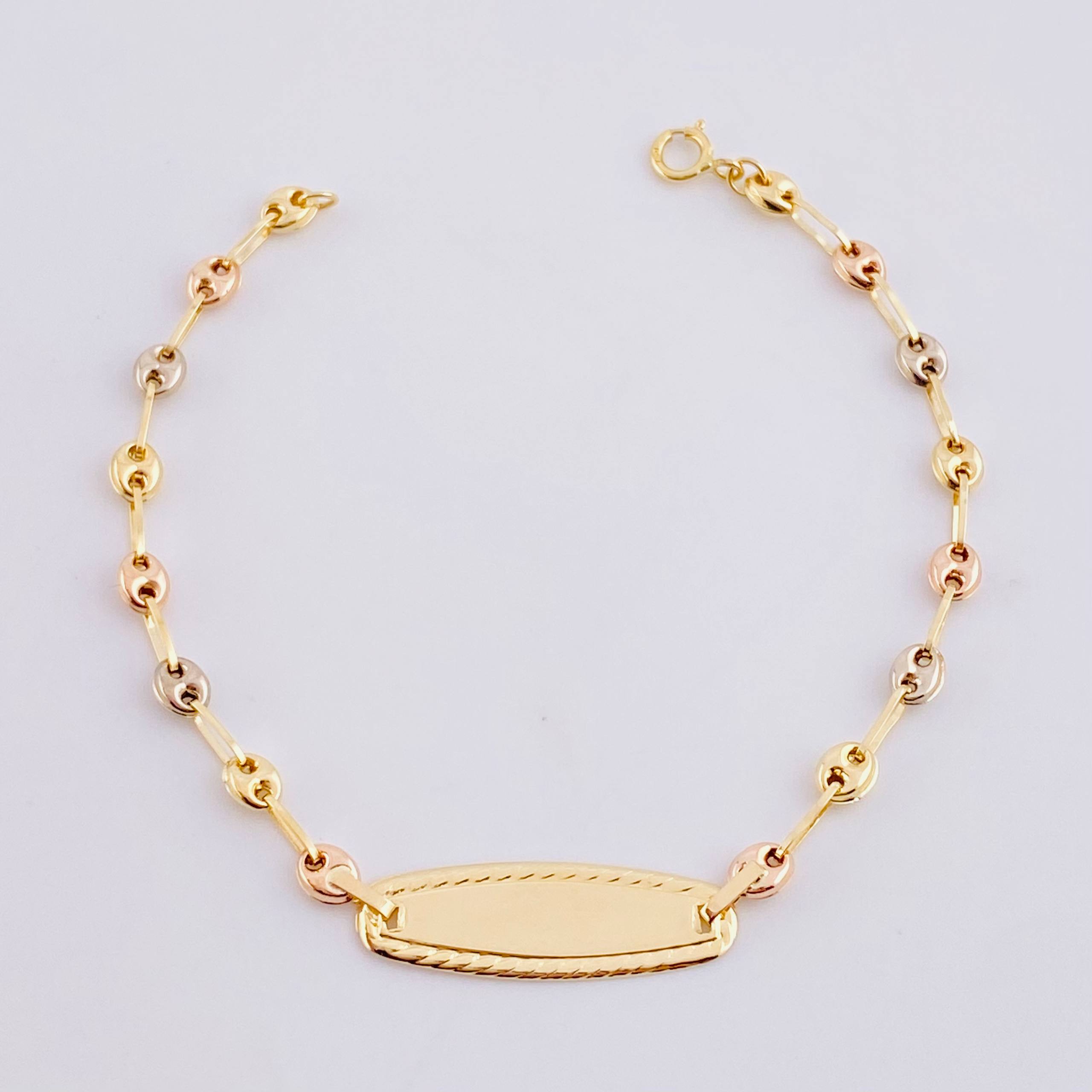 Pulso Bebé GC Placa Ovalada Bordeada 1.7g / 15cm / 3.3mm Tres Oros 18K