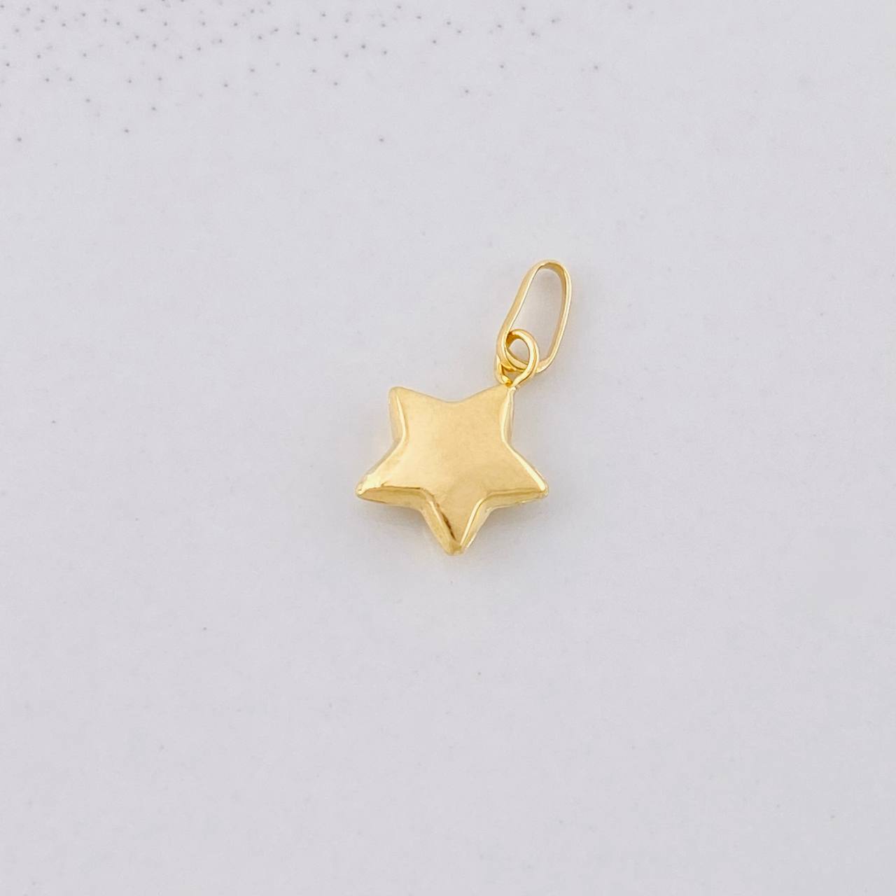 Dije Estrella 0.25g / 1.3cm Oro Amarillo 18K