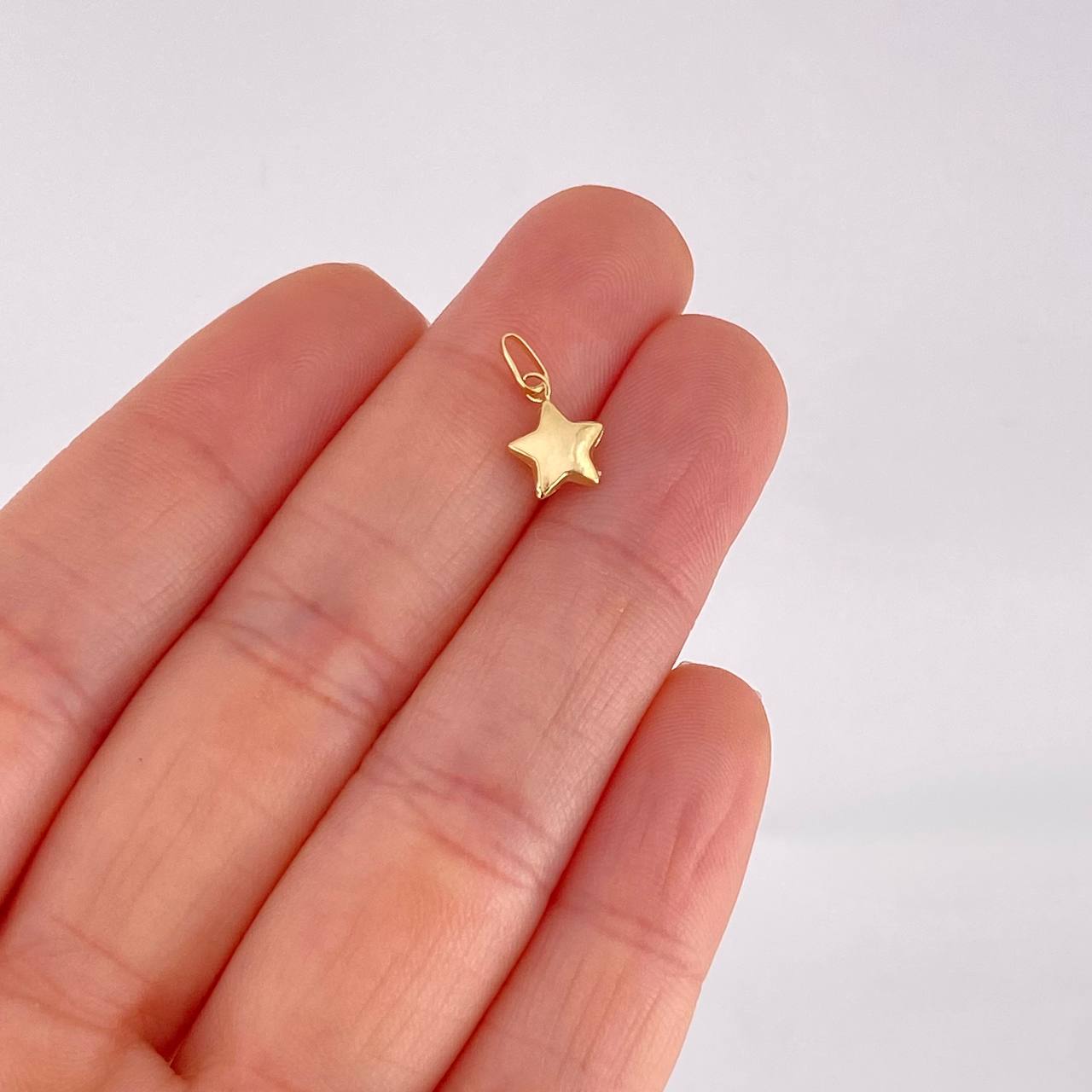 Dije Estrella 0.25g / 1.3cm Oro Amarillo 18K
