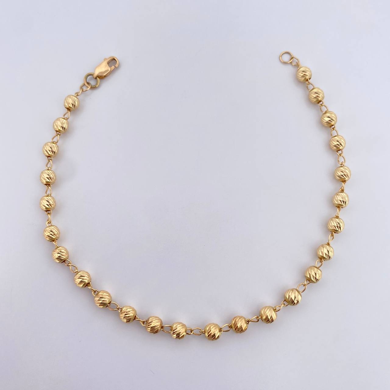 Pulso Tipo Militar 3.1gr / 19.2cm / 3.8mm Bolas Diamantadas Oro Amarillo 18K &
