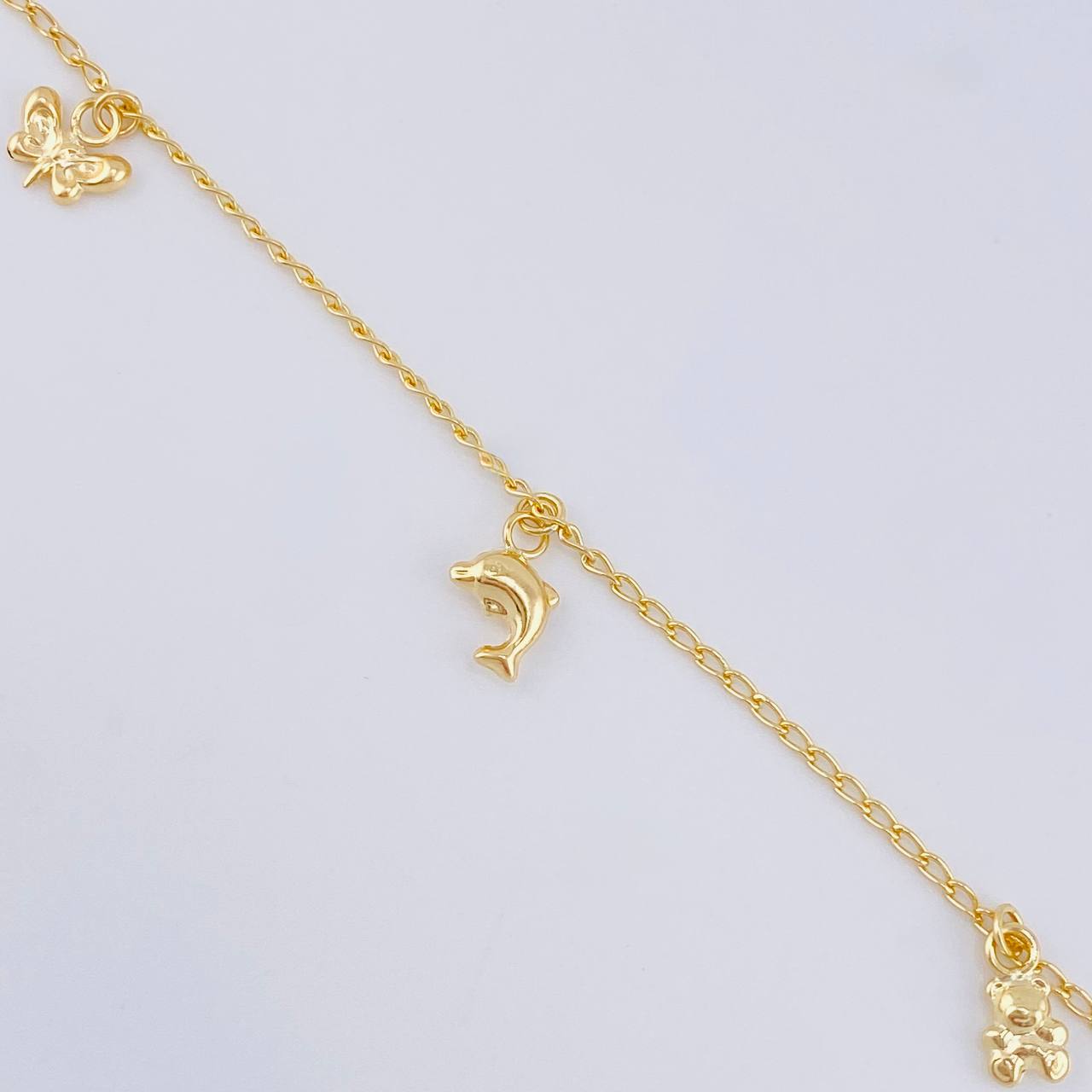 Pulso Espiga Dijes 2.35 g / 7 1/2 in / 1.4 mm Oro Amarillo 18K