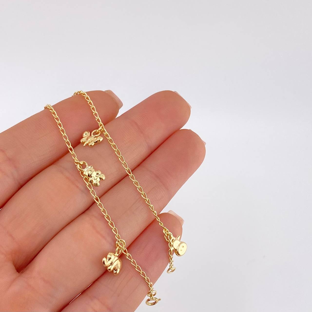 Pulso Espiga Dijes 2.35 g / 7 1/2 in / 1.4 mm Oro Amarillo 18K