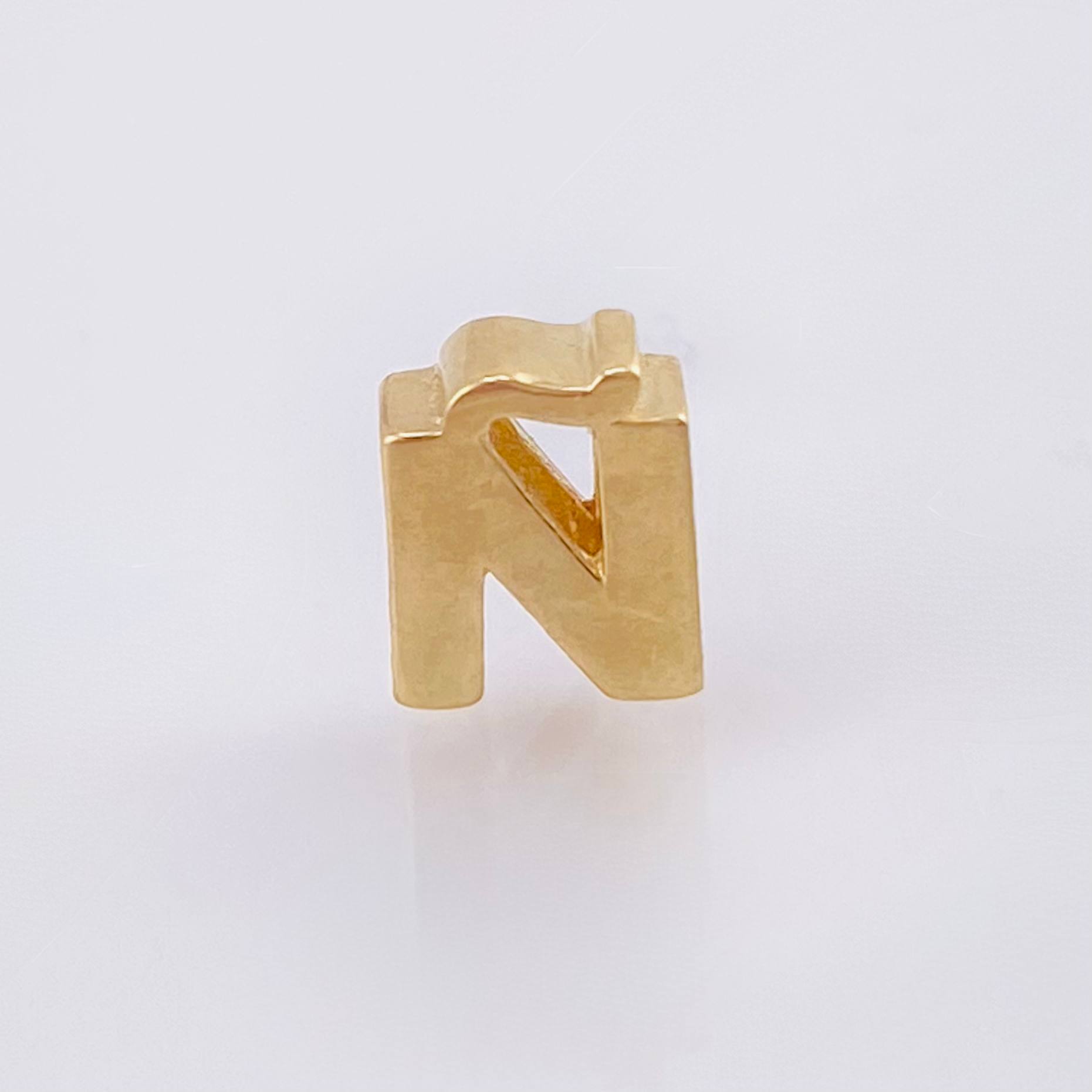 Herraje Tambor Letra Ñ 0.55gr / 7mm Oro Amarillo 18K