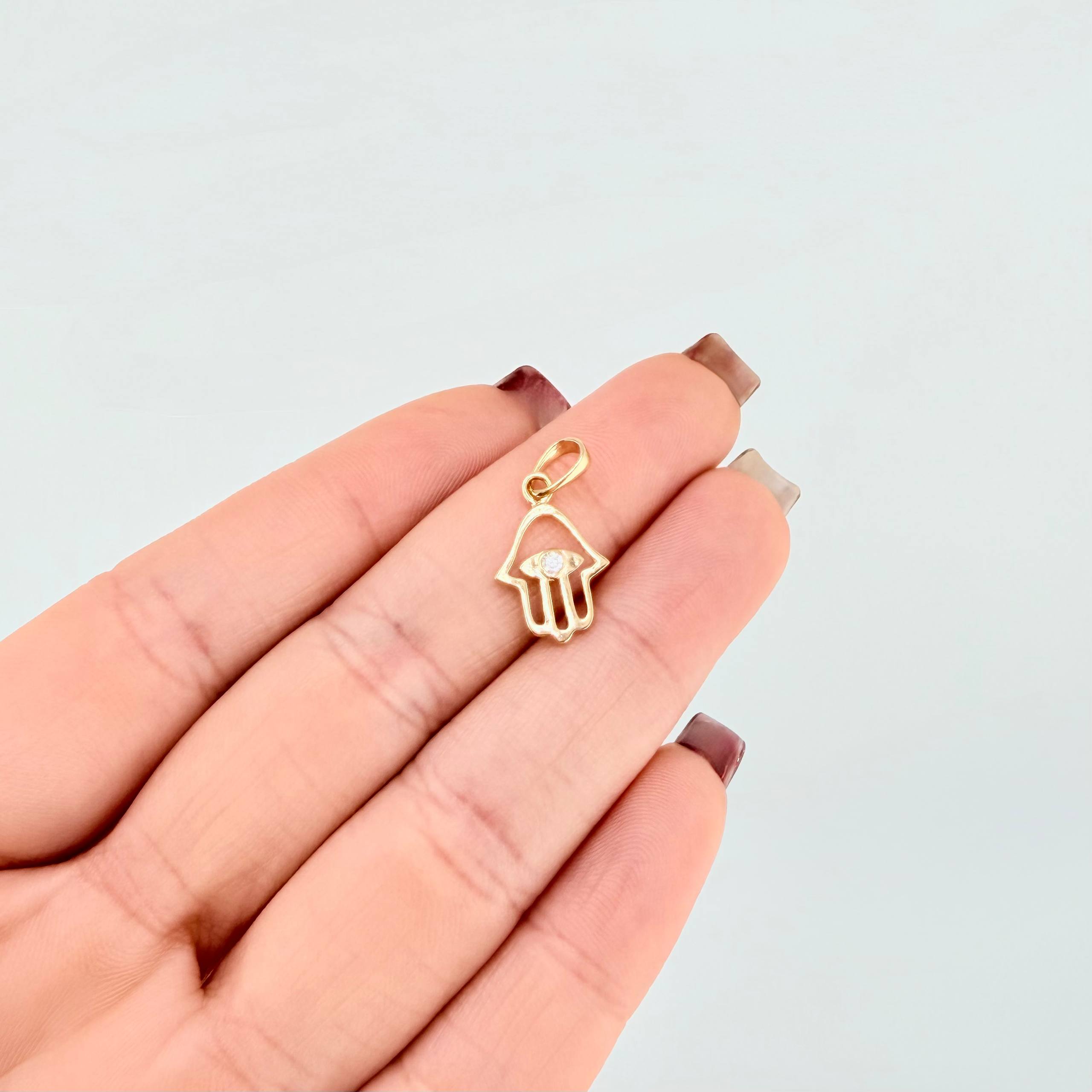 Dije Mano Hamsa 0.95gr / 3/4 in / Oro Amarillo 18K ©