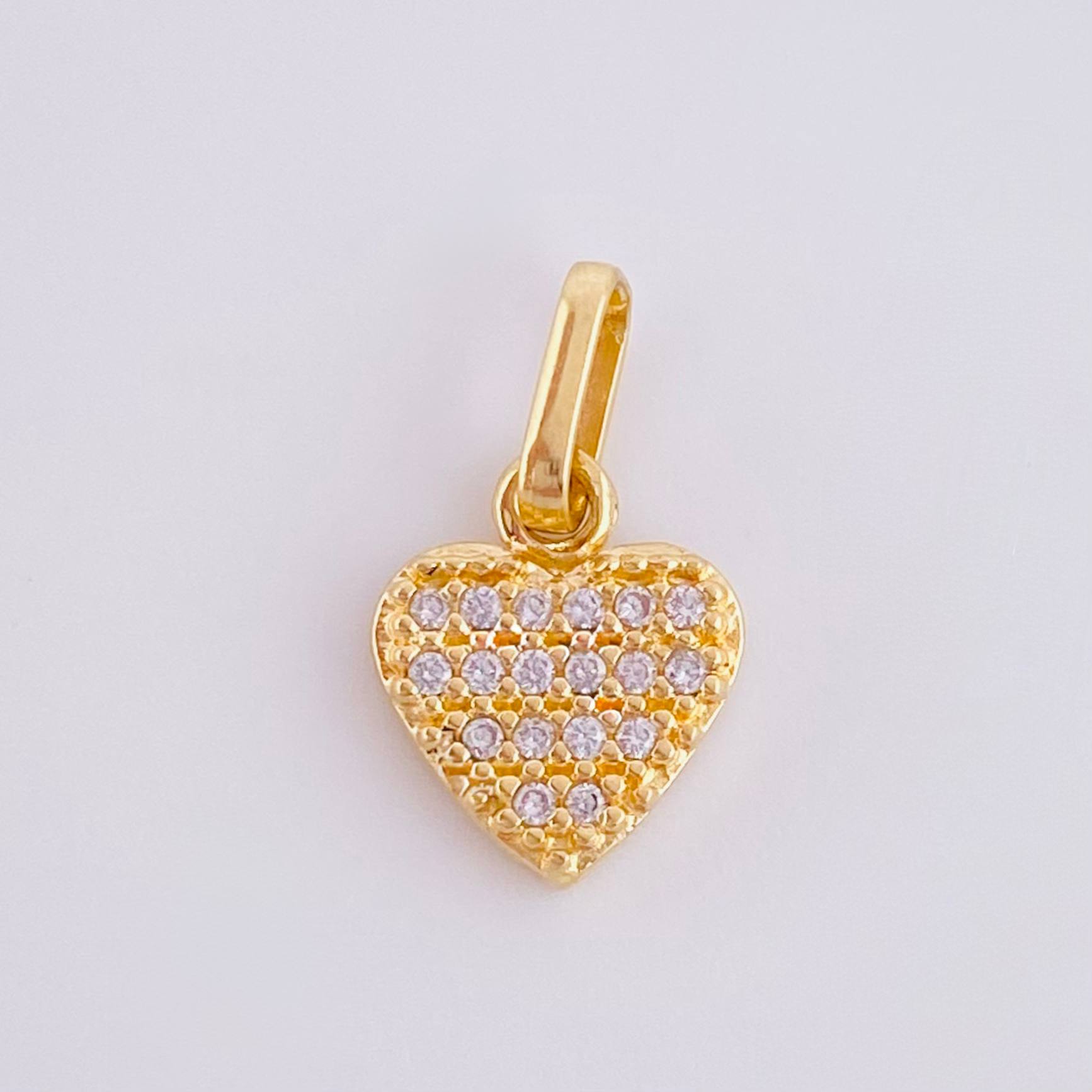 Dije Corazon Tupido 0.95gr / 1/2 in / Oro Amarillo 18K *