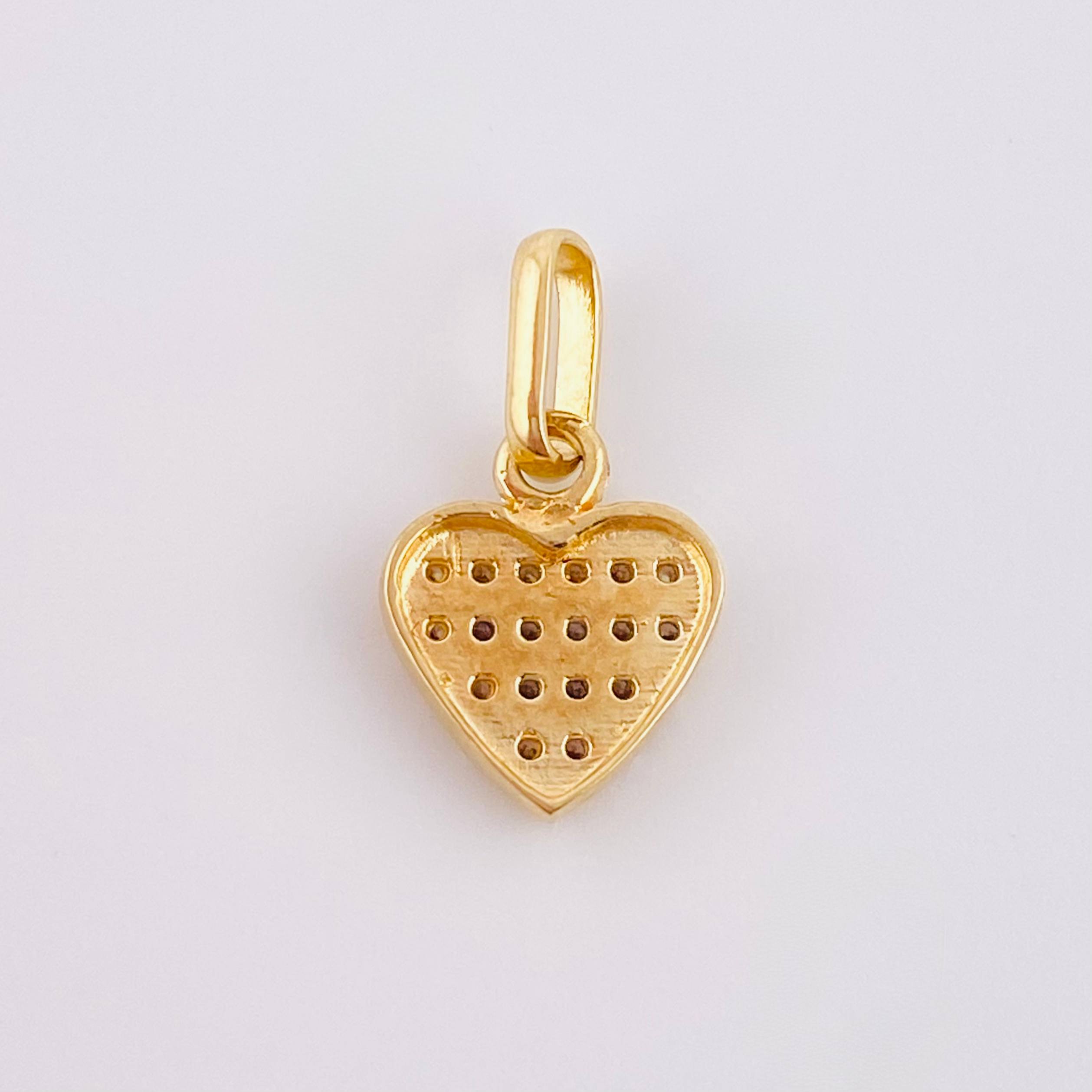 Dije Corazon Tupido 0.95gr / 1/2 in / Oro Amarillo 18K *