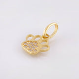 Dije Huella 0.65gr / 1/2 in / Oro Amarillo 18K